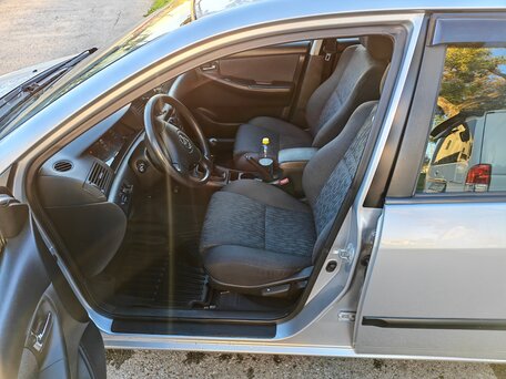 2003 Toyota Corolla IX (E120, E130), серый, 700000 рублей, вид 5