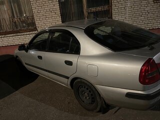 2002 Mitsubishi Carisma I Рестайлинг, серебристый, 150000 рублей, вид 1