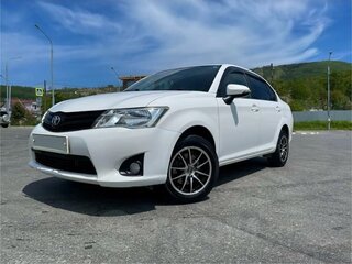 2012 Toyota Corolla Axio XI (E160, E170, E180), белый, 1050000 рублей, вид 1