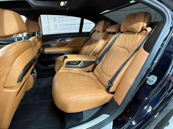 2021 BMW 7 серии Long 740Ld xDrive VI (G11/G12) Рестайлинг, синий, 6810000 рублей - вид 4