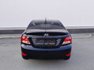 2011 Hyundai Solaris I, чёрный, 559000 рублей, вид 4