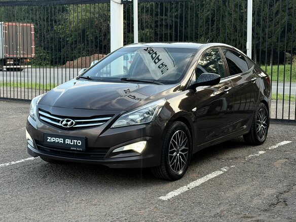 2014 Hyundai Solaris I Рестайлинг, коричневый - вид 2
