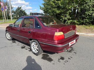 2005 Daewoo Nexia I, пурпурный, 128000 рублей, вид 5