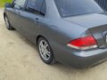 2006 Mitsubishi Lancer IX Рестайлинг, серый, 215000 рублей - вид 2