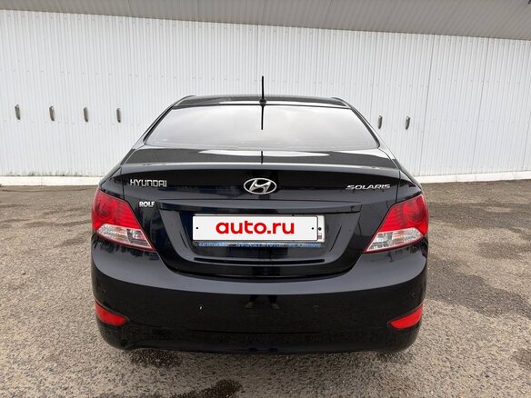 2013 Hyundai Solaris I, чёрный, 750000 рублей - вид 4