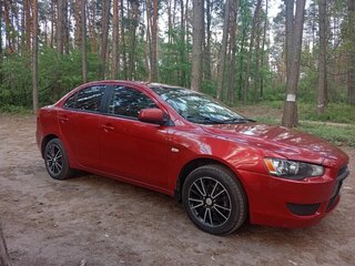 2009 Mitsubishi Lancer X, красный, 650000 рублей, вид 2