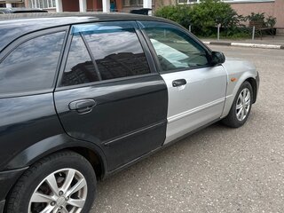 2001 Mazda 323 VI (BJ) Рестайлинг, чёрный, 155555 рублей, вид 3