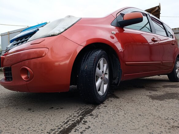 2007 Nissan Note I, оранжевый, 490000 рублей - вид 8