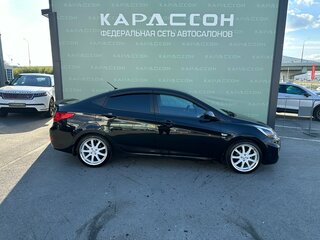 2013 Hyundai Solaris I, чёрный, 676000 рублей, вид 4
