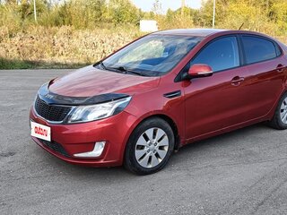 2012 Kia Rio 4-speed III, красный, 668000 рублей, вид 1