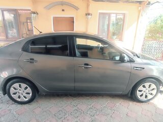2015 Kia Rio 6-speed III, серый, 1100000 рублей, вид 5