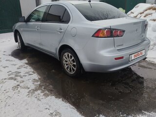 2011 Mitsubishi Lancer X Рестайлинг, серебристый, 770000 рублей, вид 3