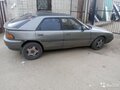 1989 Mazda 323 GT IV (BG), серебристый
