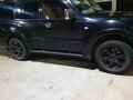 2005 Mitsubishi Pajero III Рестайлинг, чёрный, 980000 рублей - вид 1