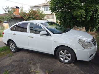 2013 Nissan Almera III (G15), белый, 700000 рублей, вид 2