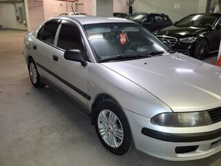 2002 Mitsubishi Carisma I Рестайлинг, серебристый, 310000 рублей, вид 1