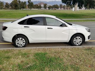 2023 Lada (ВАЗ) Vesta I Рестайлинг (NG), белый, 1350000 рублей, вид 4