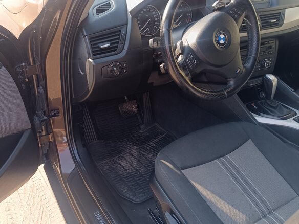 2011 BMW X1 18i I (E84), коричневый, 1500000 рублей - вид 6