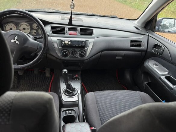 2006 Mitsubishi Lancer IX Рестайлинг, синий, 310000 рублей - вид 9