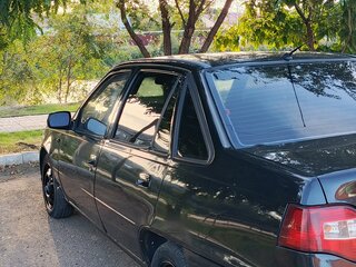 2010 Daewoo Nexia I Рестайлинг, чёрный, 230000 рублей, вид 3