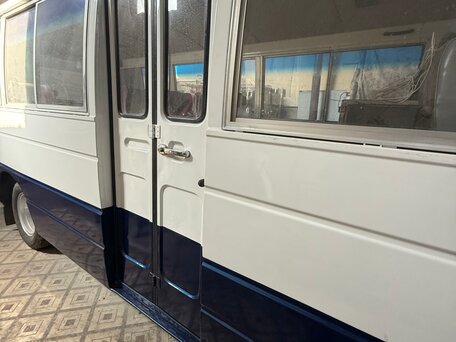 1988 Nissan Civilian, белый, 1150000 рублей, вид 3