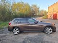 2012 BMW X1 20d I (E84) Рестайлинг, коричневый, 1470000 рублей - вид 4