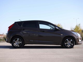 2015 Hyundai Solaris I Рестайлинг, коричневый, 865005 рублей, вид 4