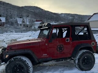 2005 Jeep Wrangler II (TJ), красный, 1800000 рублей, вид 2