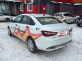 2024 Lada (ВАЗ) Vesta I Рестайлинг (NG), белый, 990000 рублей - вид 2