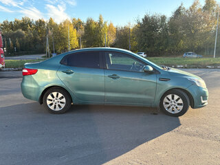 2012 Kia Rio 4-speed III, зелёный, 850000 рублей, вид 4