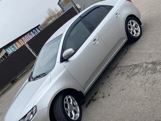 2010 Kia Cerato 6-speed II, серебристый, 850000 рублей, вид 2