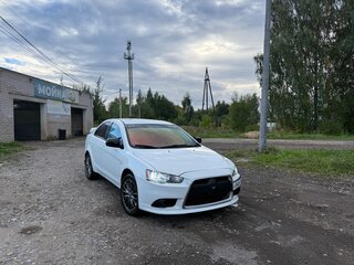 2012 Mitsubishi Lancer X Рестайлинг, белый, 730000 рублей, вид 3