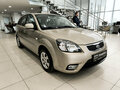 2011 Kia Rio II Рестайлинг, бежевый, 430000 рублей - вид 2