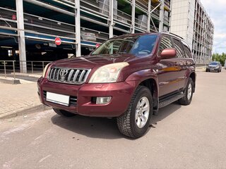 2007 Toyota Land Cruiser Prado 4-speed 120 Series Рестайлинг, красный, 3200000 рублей, вид 1