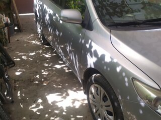2012 Toyota Corolla X (E140, E150) Рестайлинг, серебристый, 1100000 рублей, вид 4