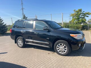 2012 Toyota Land Cruiser 200 Series Рестайлинг 1, чёрный, 3100000 рублей, вид 2