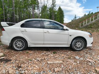 2011 Mitsubishi Lancer X Рестайлинг, белый, 640000 рублей, вид 2