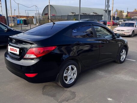 2012 Hyundai Solaris I, чёрный, 630000 рублей, вид 4
