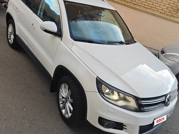 2011 Volkswagen Tiguan I Рестайлинг, белый - вид 1