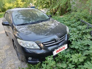 2010 Toyota Corolla X (E140, E150), чёрный, 700000 рублей, вид 1