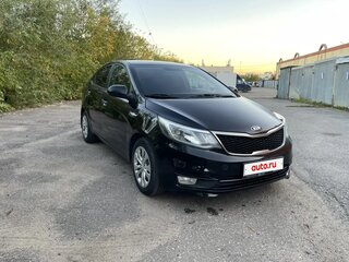 2015 Kia Rio III Рестайлинг, чёрный, 695000 рублей, вид 1