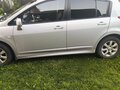 2011 Nissan Tiida I Рестайлинг, серебристый, 900000 рублей - вид 5