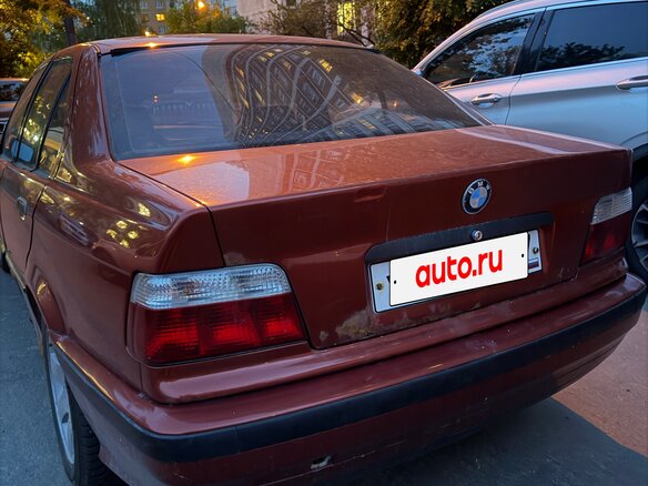 1994 BMW 3 серии 318i III (E36), оранжевый, 200000 рублей - вид 6