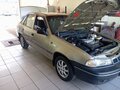 2005 Daewoo Nexia I, жёлтый