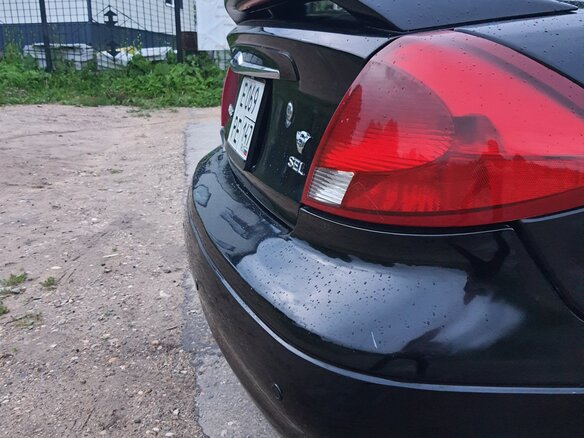 2001 Ford Taurus IV, чёрный - вид 12