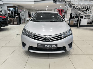 2013 Toyota Corolla XI (E160, E170, E180), серебристый, 899000 рублей, вид 2
