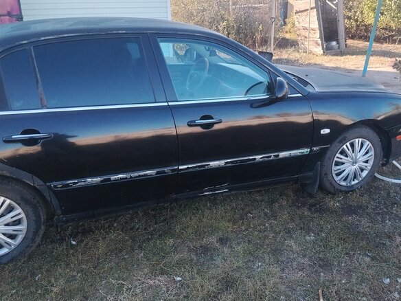 2005 Kia Opirus I, чёрный - вид 1