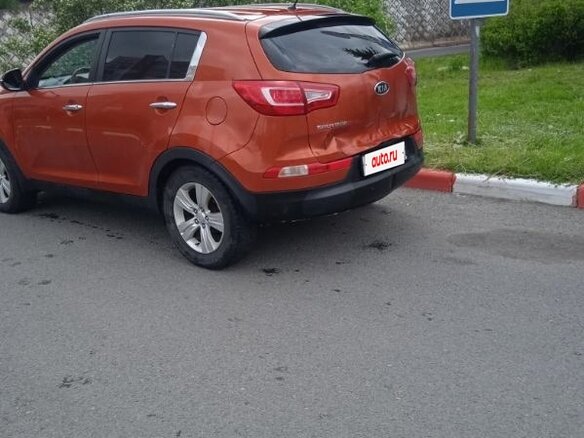 2011 Kia Sportage III, оранжевый, 950000 рублей - вид 2
