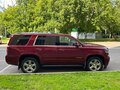 2019 Chevrolet Tahoe IV, красный, 4450000 рублей - вид 1