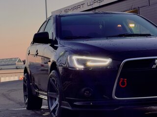 2011 Mitsubishi Lancer X Рестайлинг, чёрный, 900000 рублей, вид 2